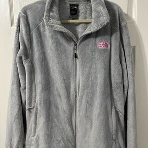 North Face Osito Jacket with Breast Cancer logo on sleeve.